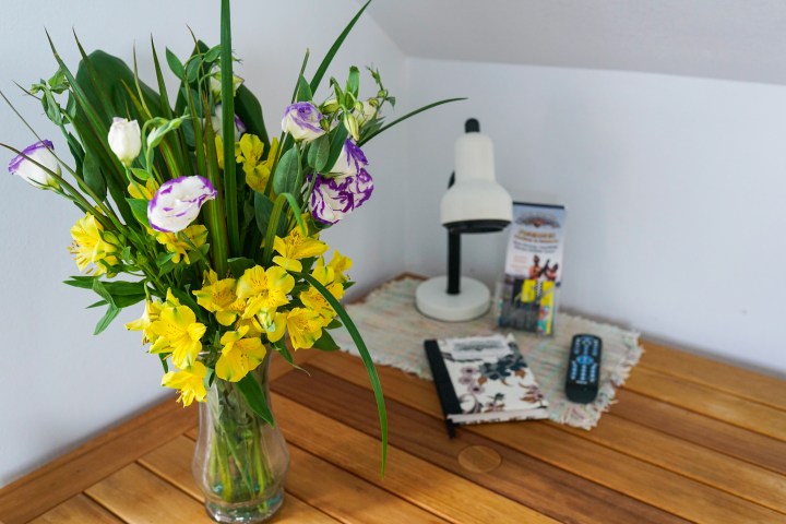 a bouquet of flowers in a vase on a table