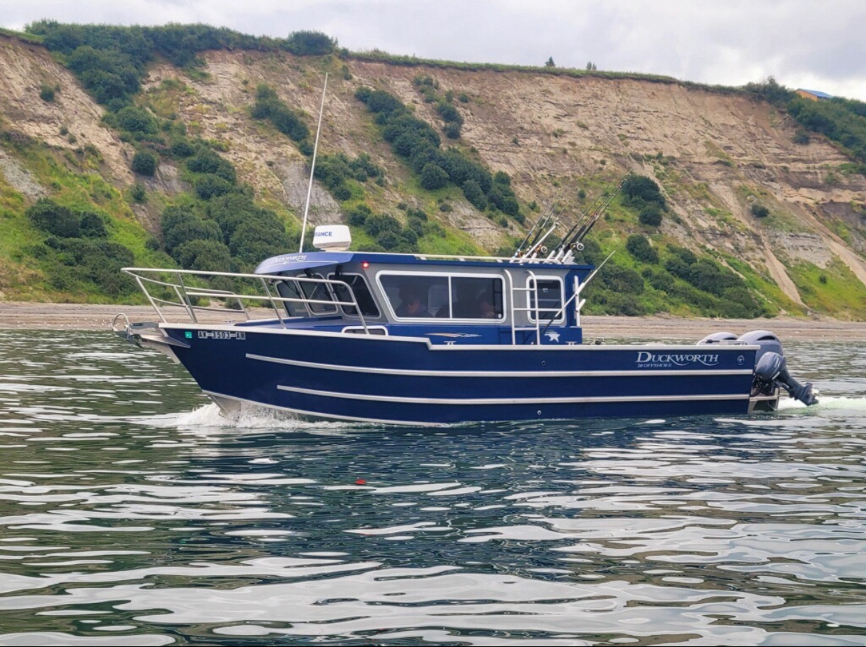 a small boat in a large body of water